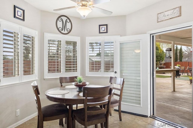 dining area with ceiling fan