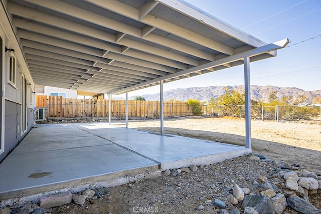 view of patio / terrace with a mountain view