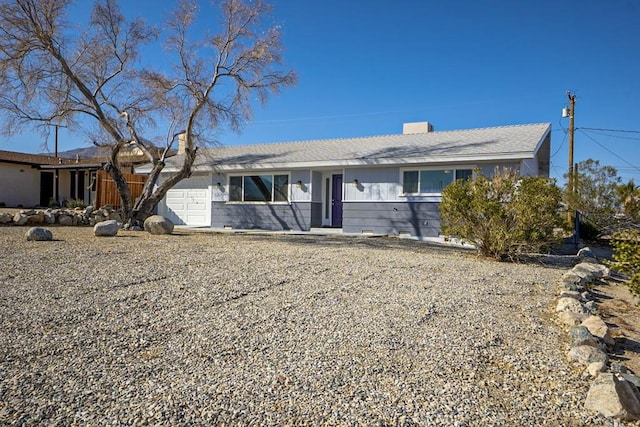 ranch-style house with a garage