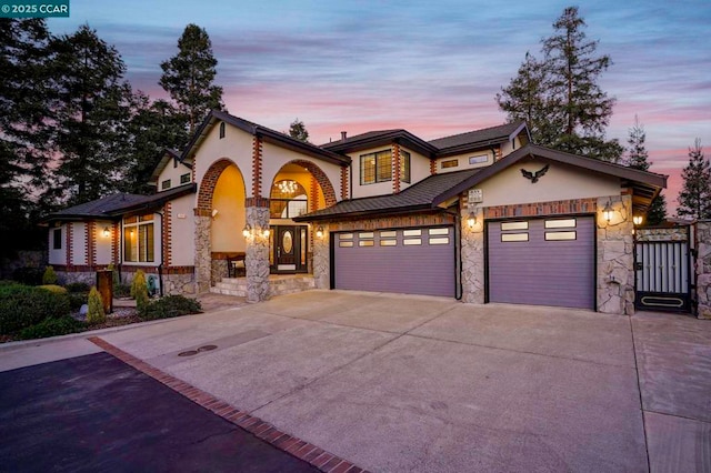 view of front of property featuring a garage