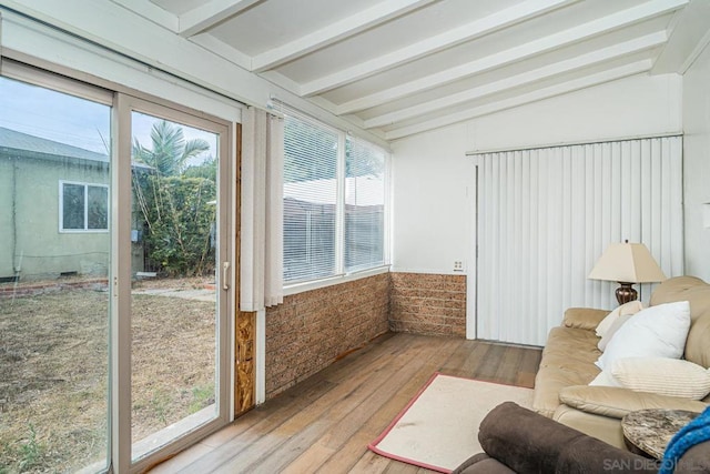 sunroom / solarium with vaulted ceiling with beams and plenty of natural light