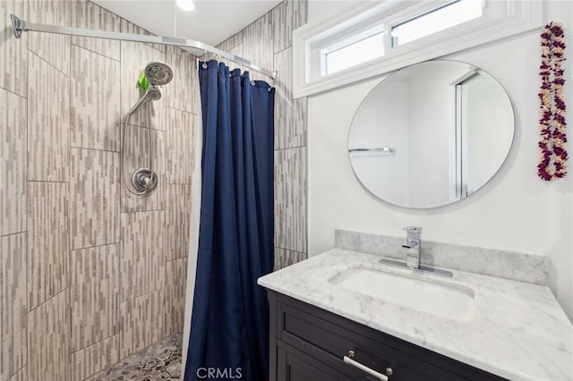 bathroom with vanity and a shower with curtain