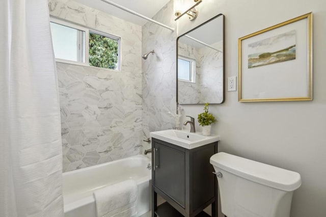 full bathroom featuring vanity, toilet, and shower / bath combo