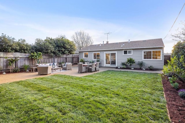 rear view of property with an outdoor hangout area, a patio area, and a lawn