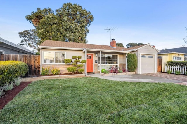 single story home featuring a garage and a front lawn