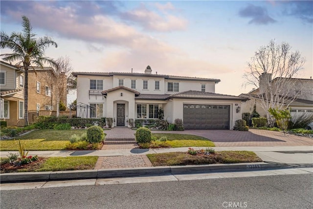 view of front of home with a garage