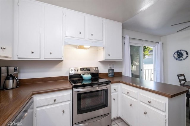 kitchen featuring ceiling fan, stainless steel appliances, kitchen peninsula, and white cabinets