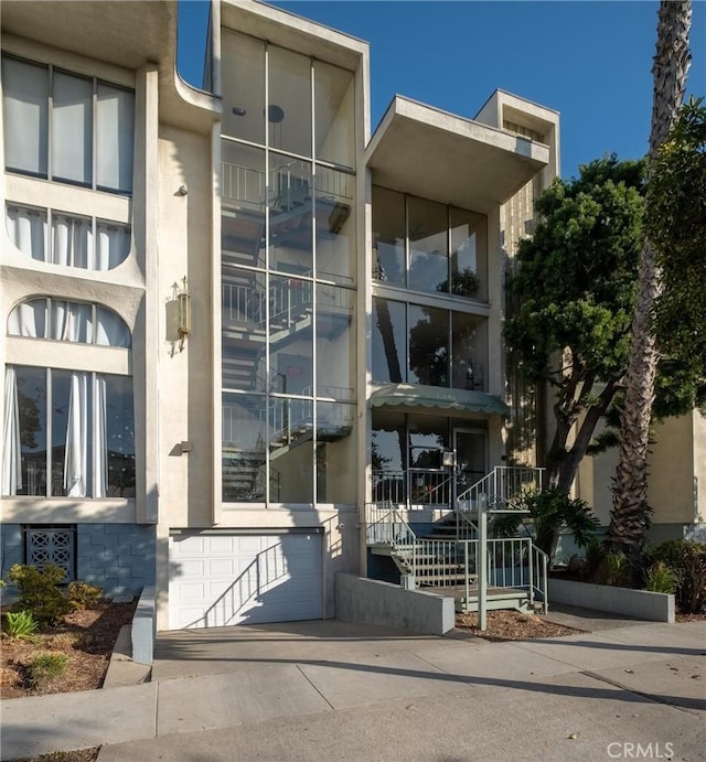 view of building exterior featuring a garage