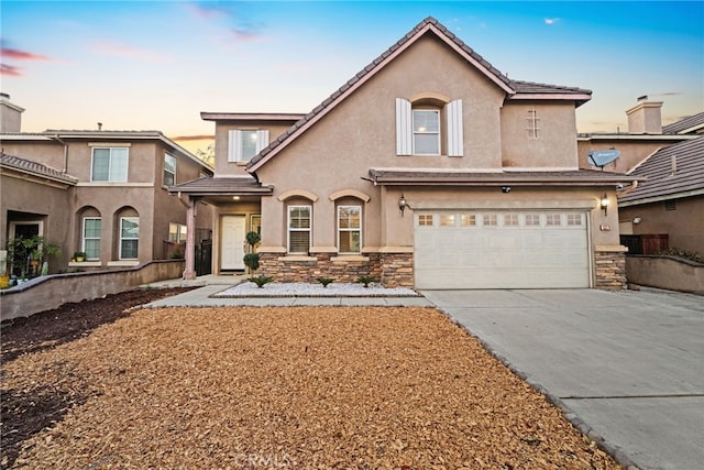 view of front of home with a garage