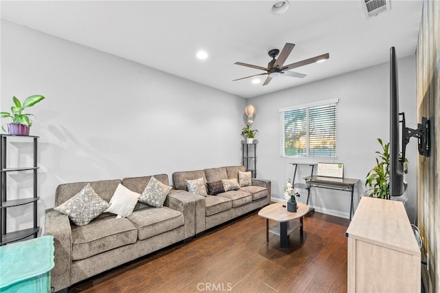 living area with baseboards, visible vents, a ceiling fan, dark wood-type flooring, and recessed lighting