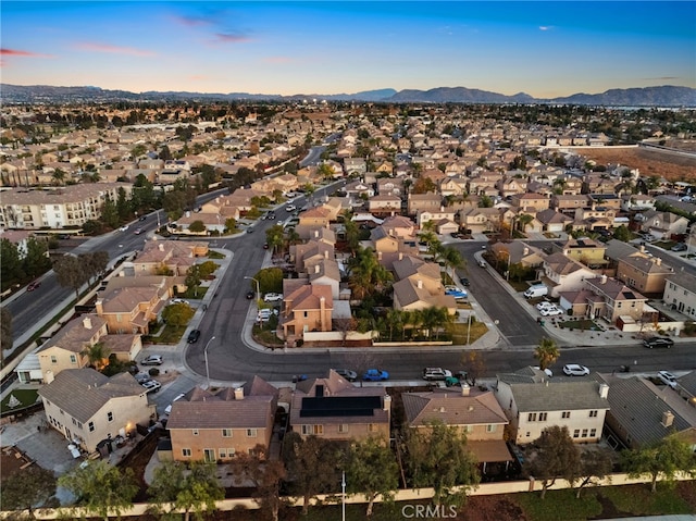 aerial view at dusk with a mountain view