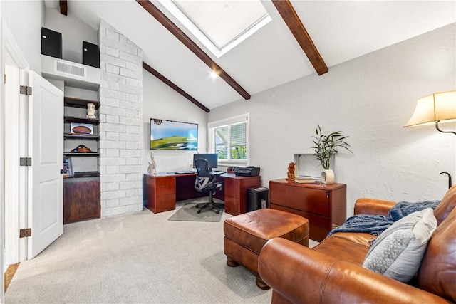 office area featuring a skylight, visible vents, light colored carpet, beamed ceiling, and high vaulted ceiling