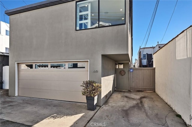 view of property exterior with a garage