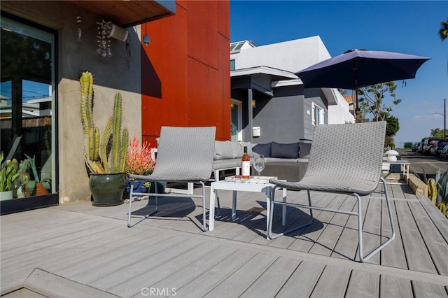 deck featuring an outdoor hangout area