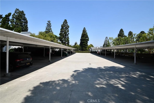 view of parking with a carport