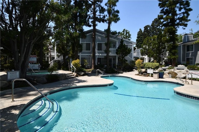 view of pool featuring a patio