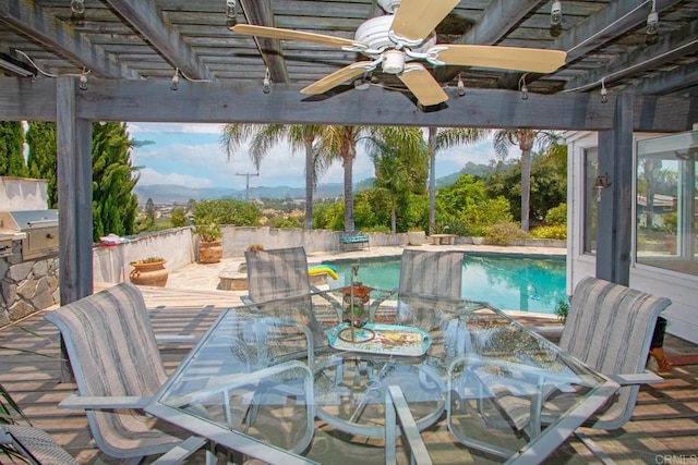 view of swimming pool featuring a fenced in pool, a pergola, and outdoor dining area