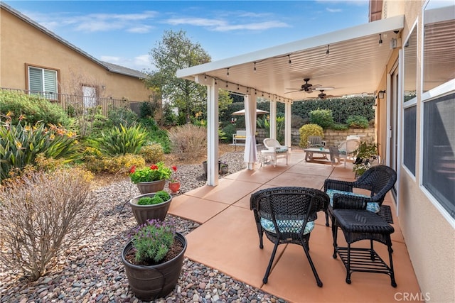 view of patio / terrace with ceiling fan