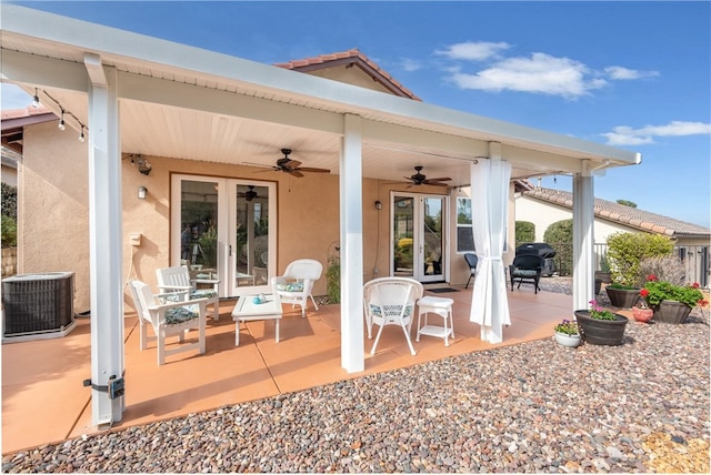 view of patio / terrace with area for grilling, central AC unit, french doors, and ceiling fan