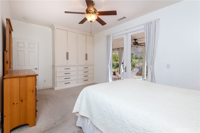 bedroom with access to exterior, light colored carpet, and ceiling fan