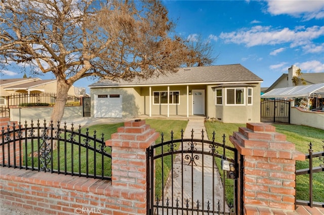 view of front facade with a garage and a front lawn