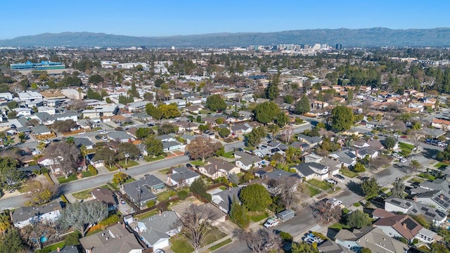 drone / aerial view featuring a mountain view