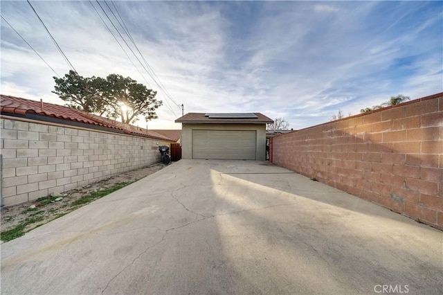 garage featuring solar panels