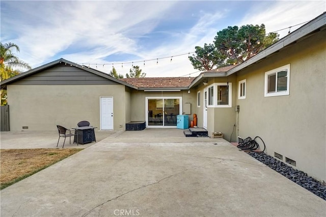 rear view of house with a patio area