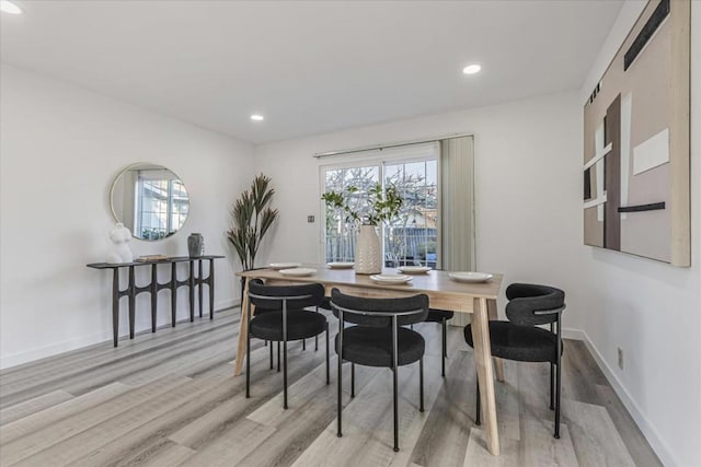 dining room featuring light hardwood / wood-style floors