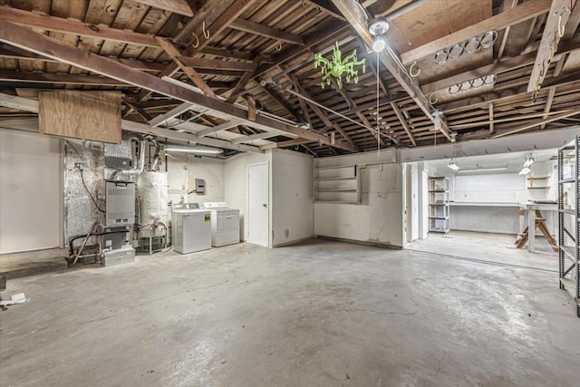 basement with washer and clothes dryer