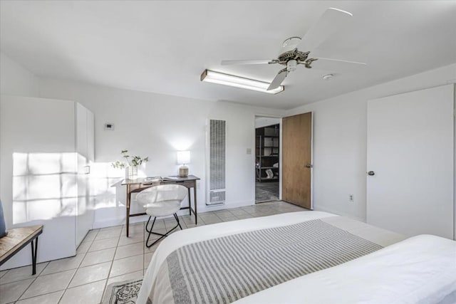 bedroom featuring ceiling fan and light tile patterned floors