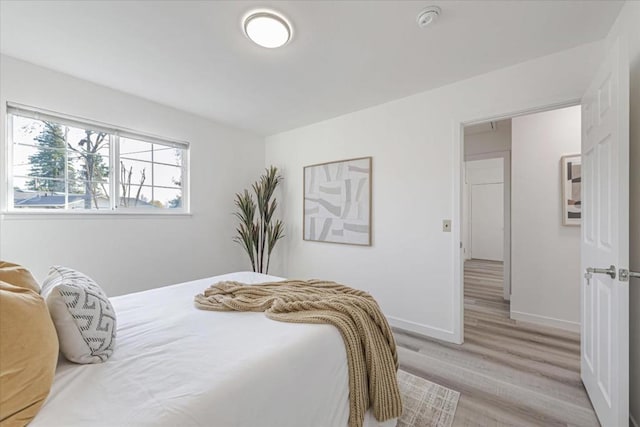 bedroom featuring light hardwood / wood-style floors