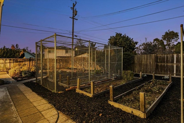 view of yard at dusk