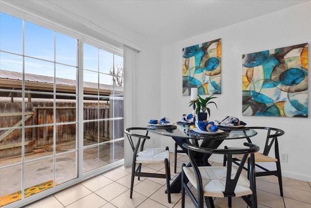 dining room with tile patterned floors