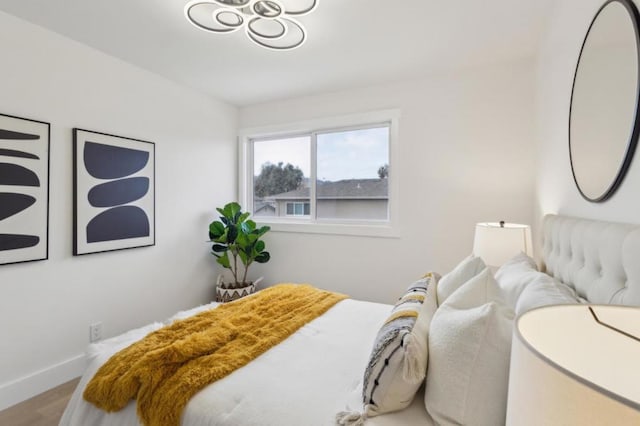 bedroom featuring hardwood / wood-style floors