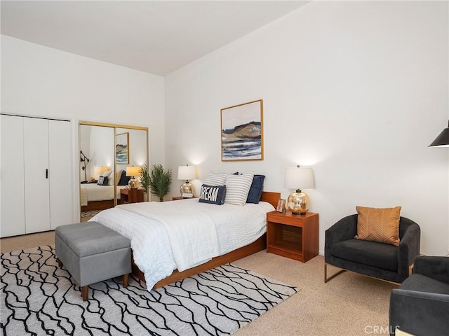 carpeted bedroom with two closets