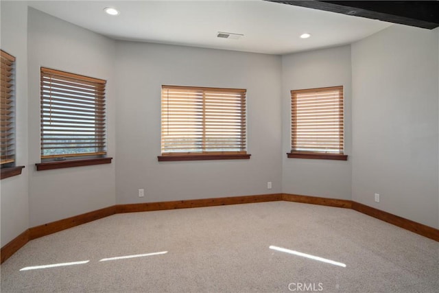 view of carpeted spare room