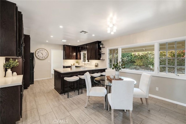 dining space featuring sink