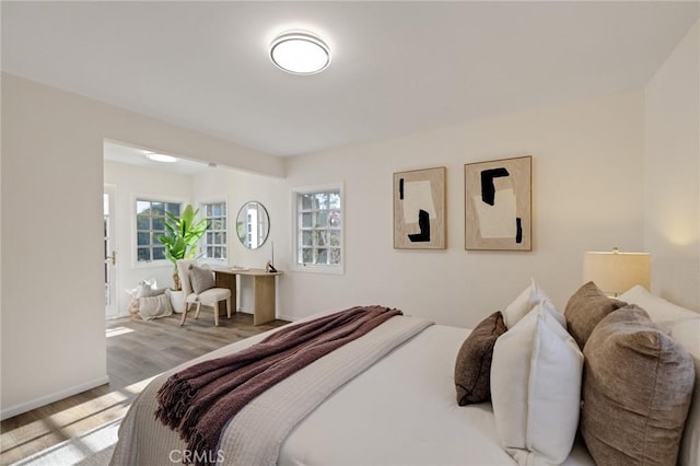 bedroom featuring light wood-type flooring