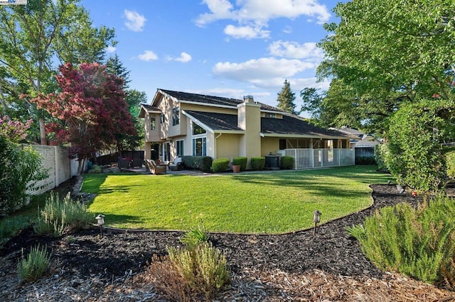 view of property exterior featuring cooling unit and a yard