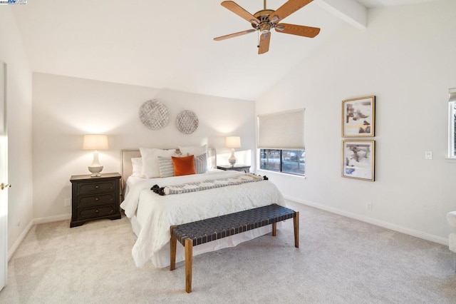 bedroom featuring light carpet, ceiling fan, high vaulted ceiling, and beamed ceiling