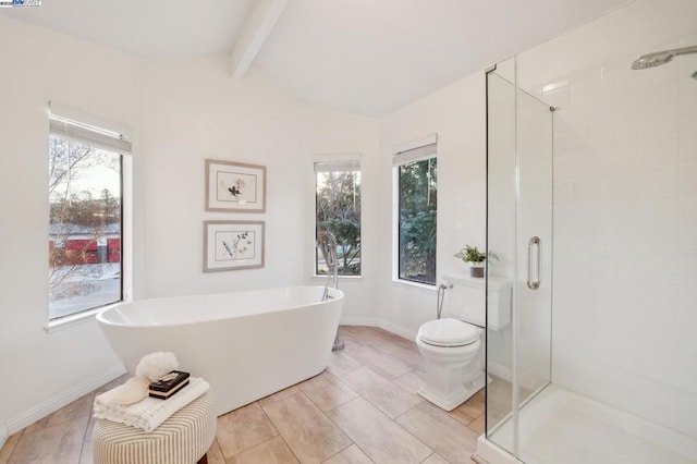 bathroom featuring toilet, a healthy amount of sunlight, shower with separate bathtub, and vaulted ceiling with beams