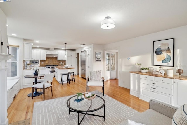 living room with light hardwood / wood-style floors