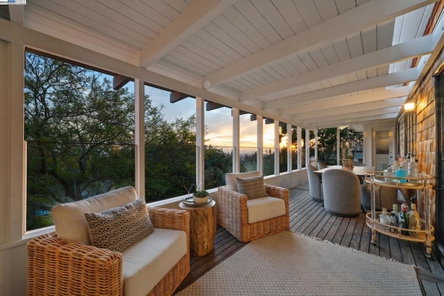 sunroom with beam ceiling