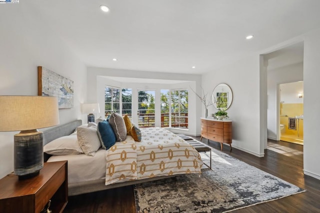 bedroom featuring dark hardwood / wood-style flooring