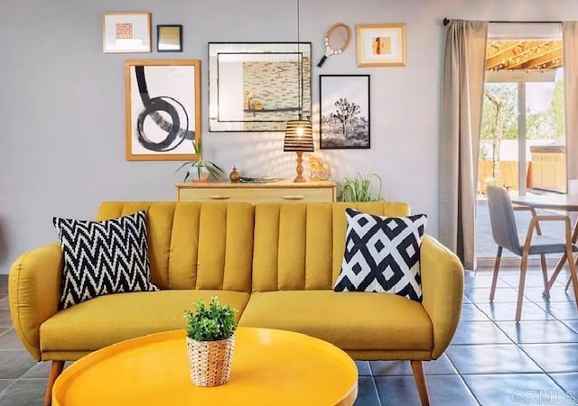 living area featuring tile patterned floors