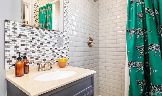 bathroom with vanity and curtained shower