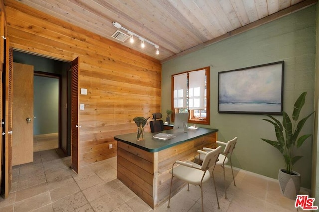 home office with wooden walls, wooden ceiling, and rail lighting