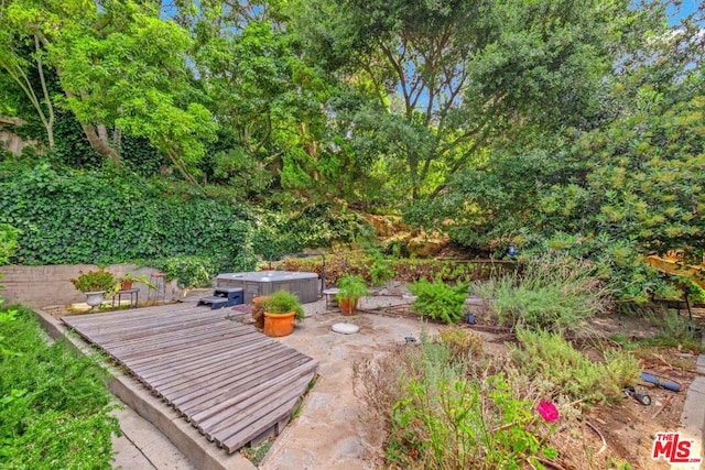 view of patio featuring a hot tub