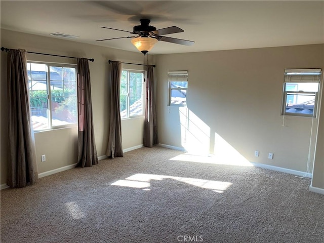 spare room featuring ceiling fan